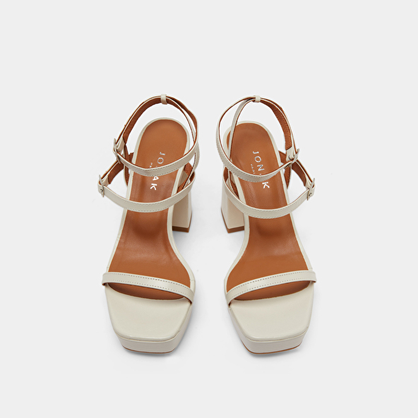 Strap and platform sandals in unbleached distressed leather | VLADO