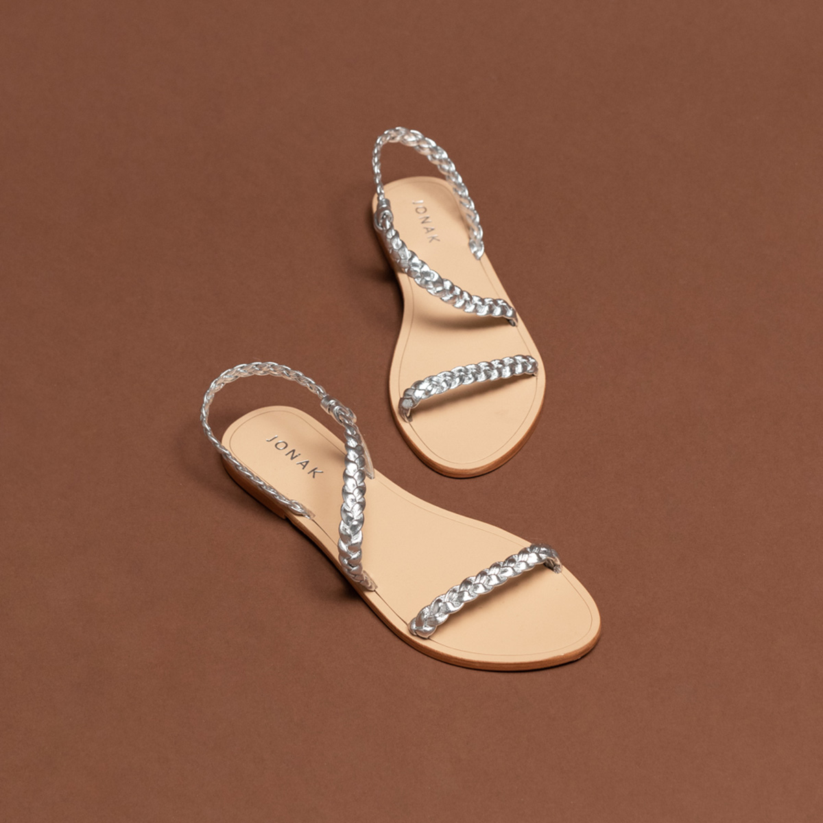 Braided strappy sandals in gold metallic leather | WINDY