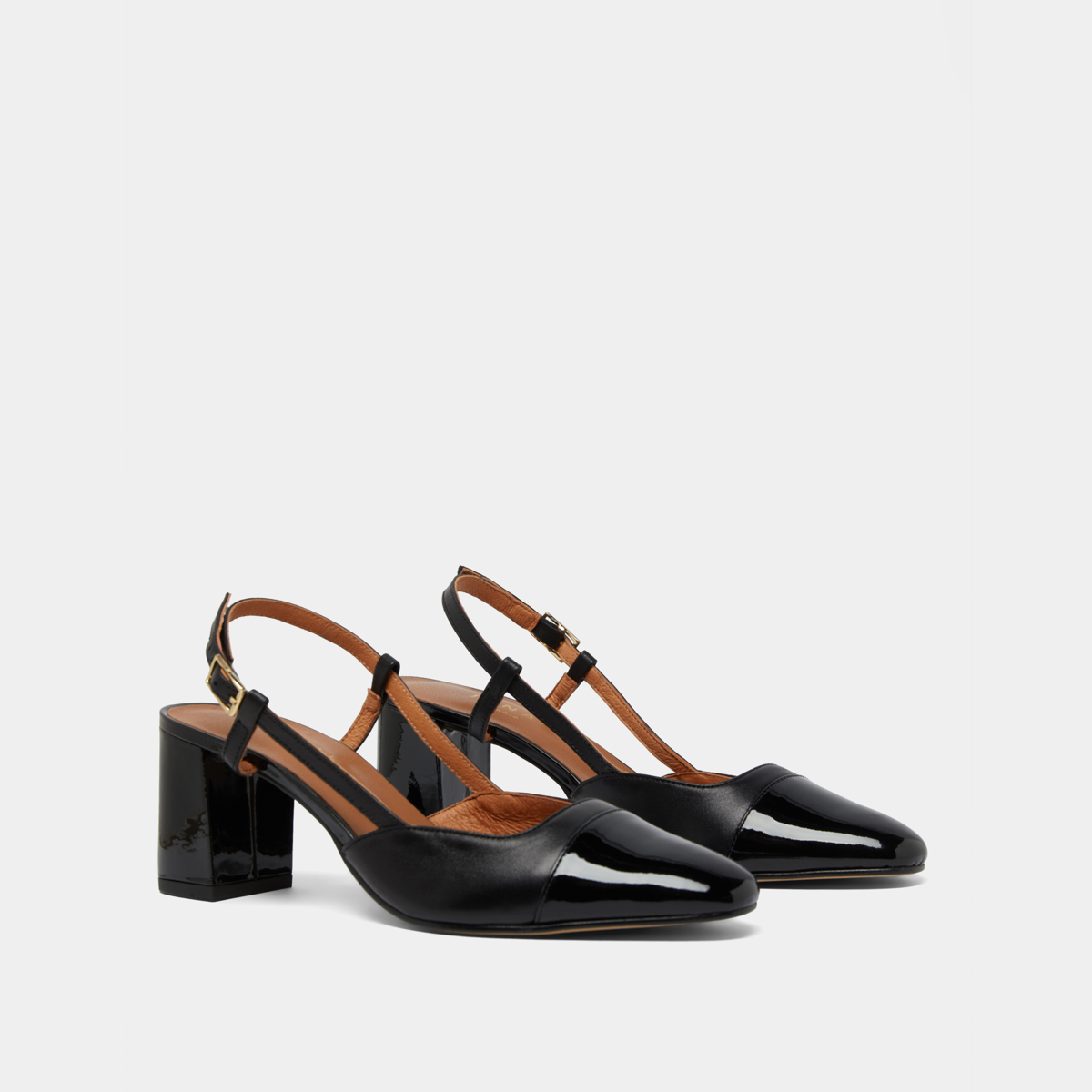 Mary Janes with heels in black patent and leather | DHAPOP