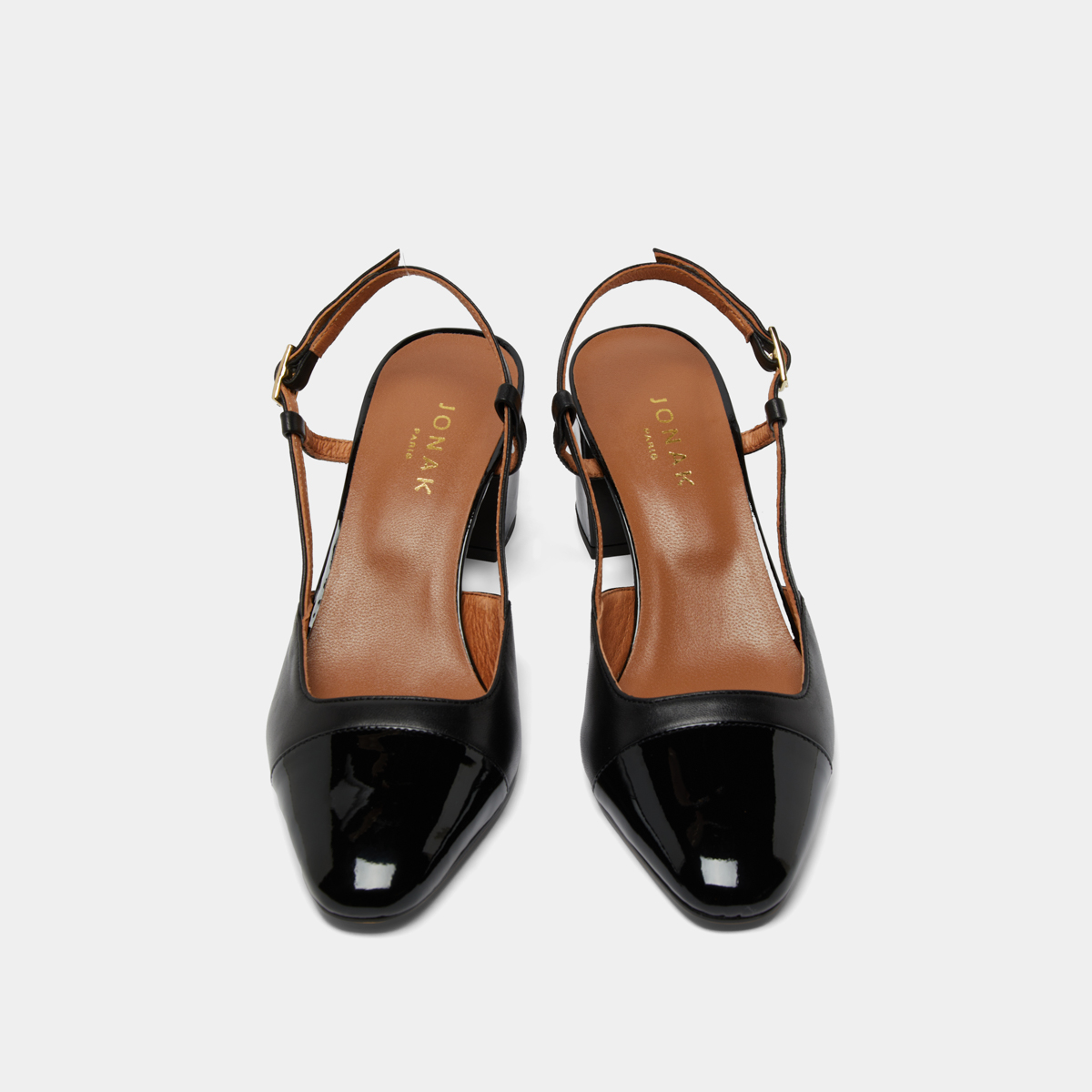 Mary Janes with heels in black patent and leather | DHAPOP