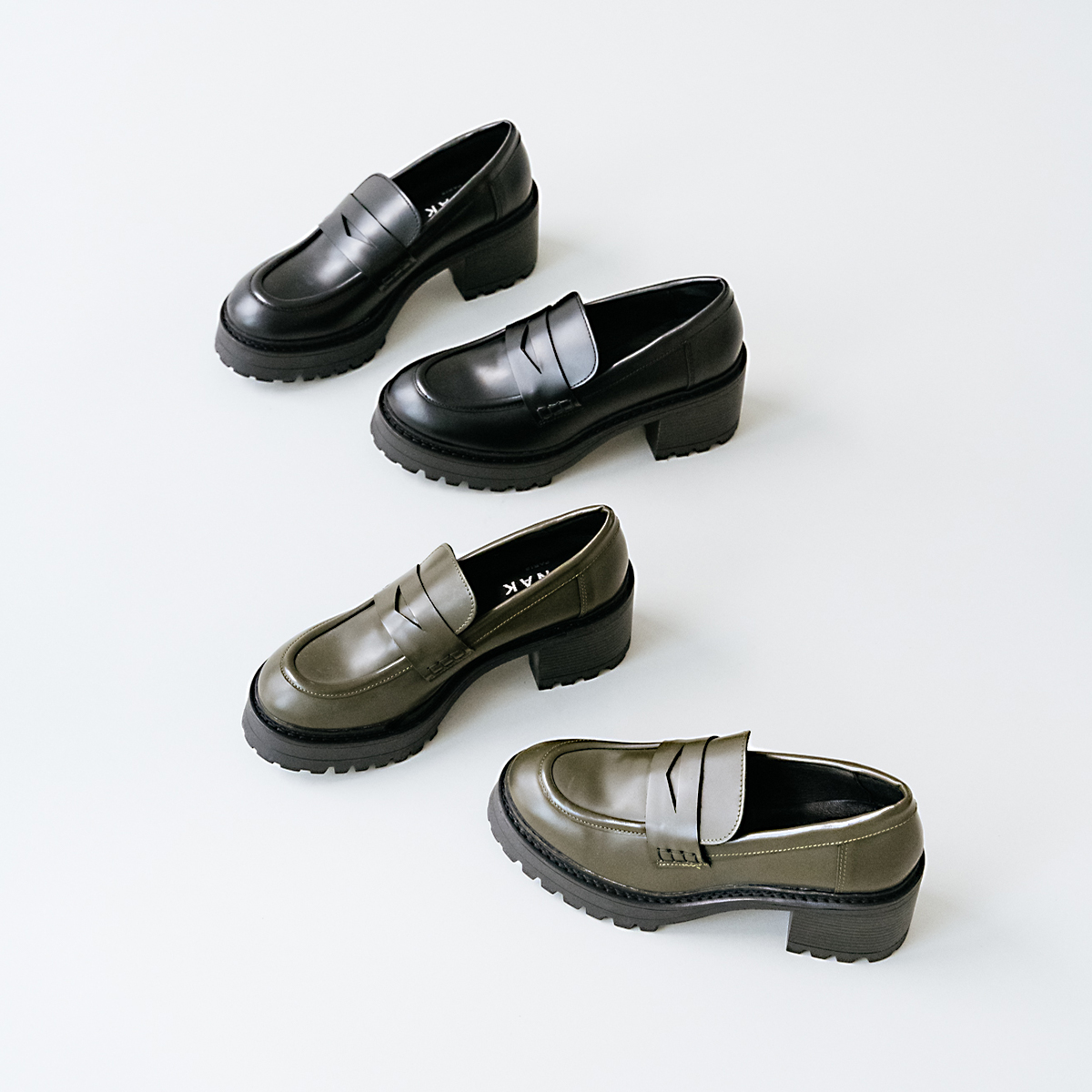 Heeled loafers with notched soles in kaki shiny leather | RHUM