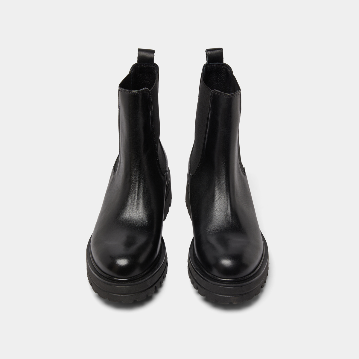Boots with notched and elastic soles in black leather | AMANDINE
