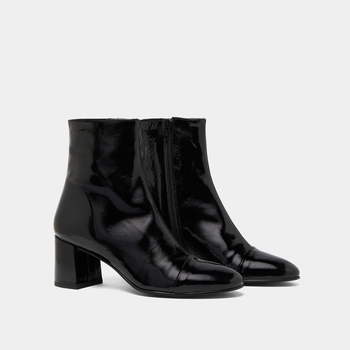 Heeled boots in black pleated patent | DONIAMA