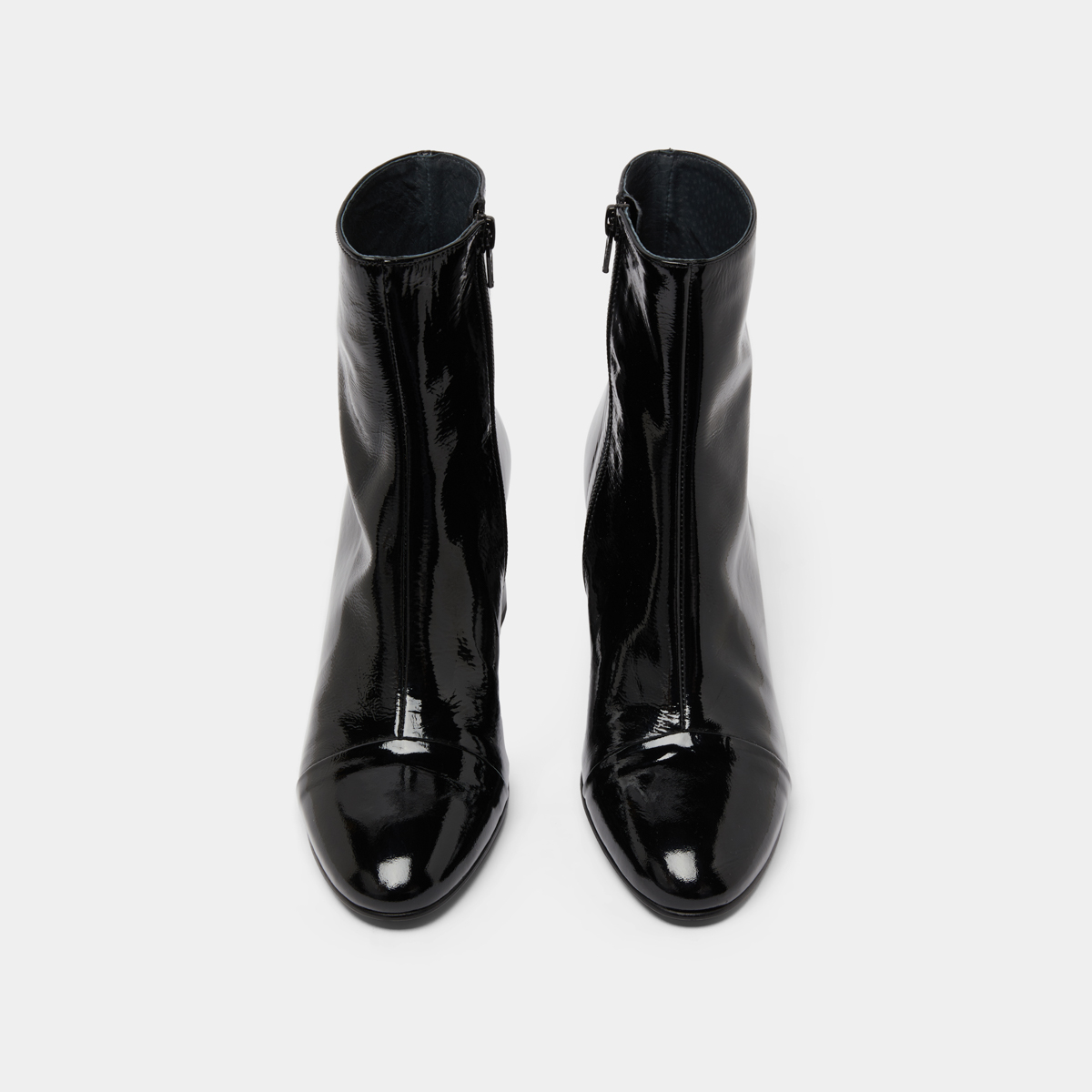 Heeled boots in black pleated patent | DONIAMA