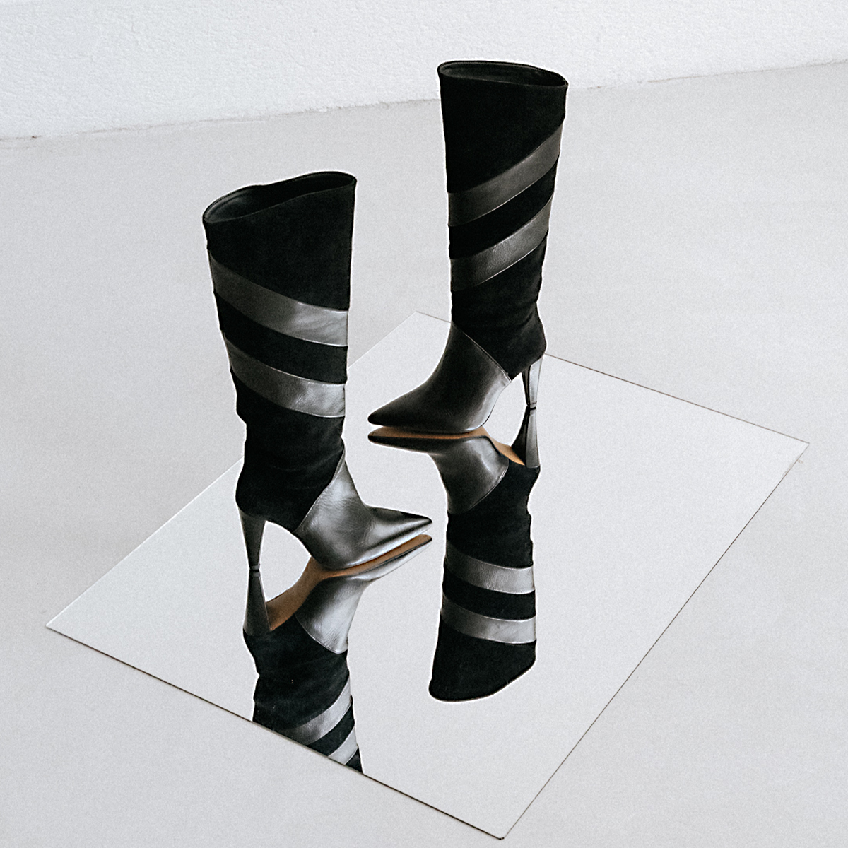 High boots with pointed toes in black suede and leather | BIAGGIO