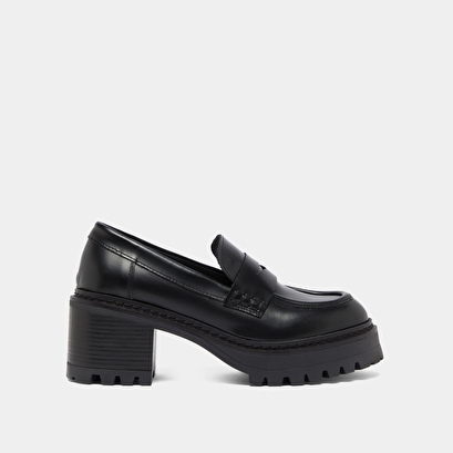 Mocassins &agrave; talons et semelles crant&eacute;es.... in black shiny leather | rhum