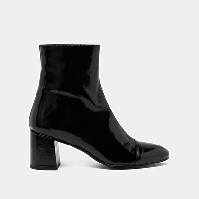 Heeled boots in black pleated patent | doniama