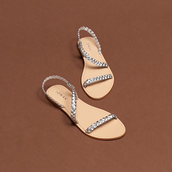 Braided strappy sandals in gold metallic leather | WINDY
