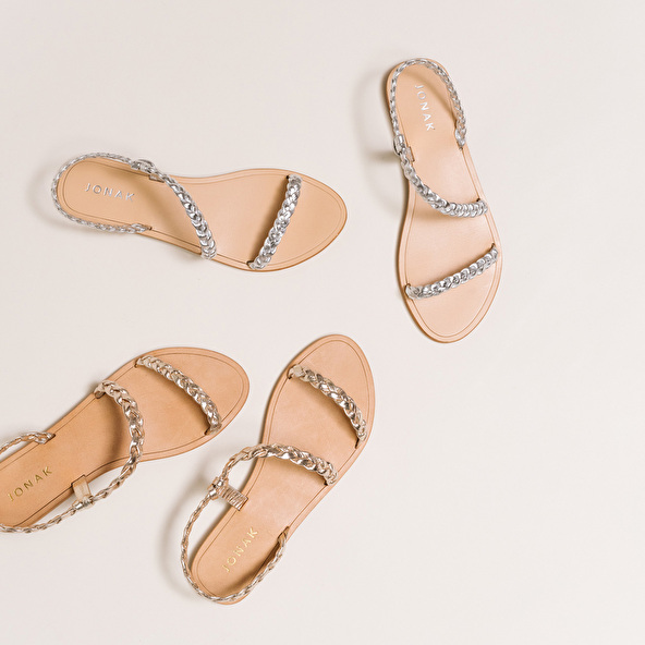 Braided strappy sandals in gold metallic leather | WINDY