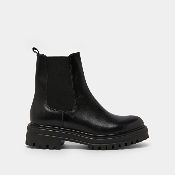 Boots with notched and elastic soles in black leather | AMANDINE