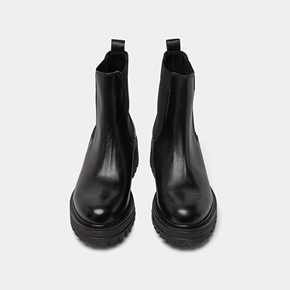 Boots with notched and elastic soles in black leather | AMANDINE