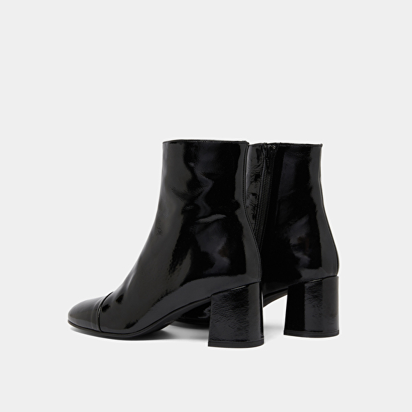 Heeled boots in black pleated patent | DONIAMA