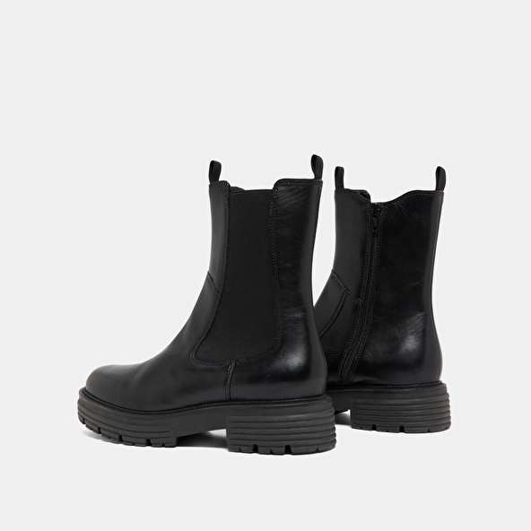 Ankle boots with notched soles in black leather | ANTONELLE