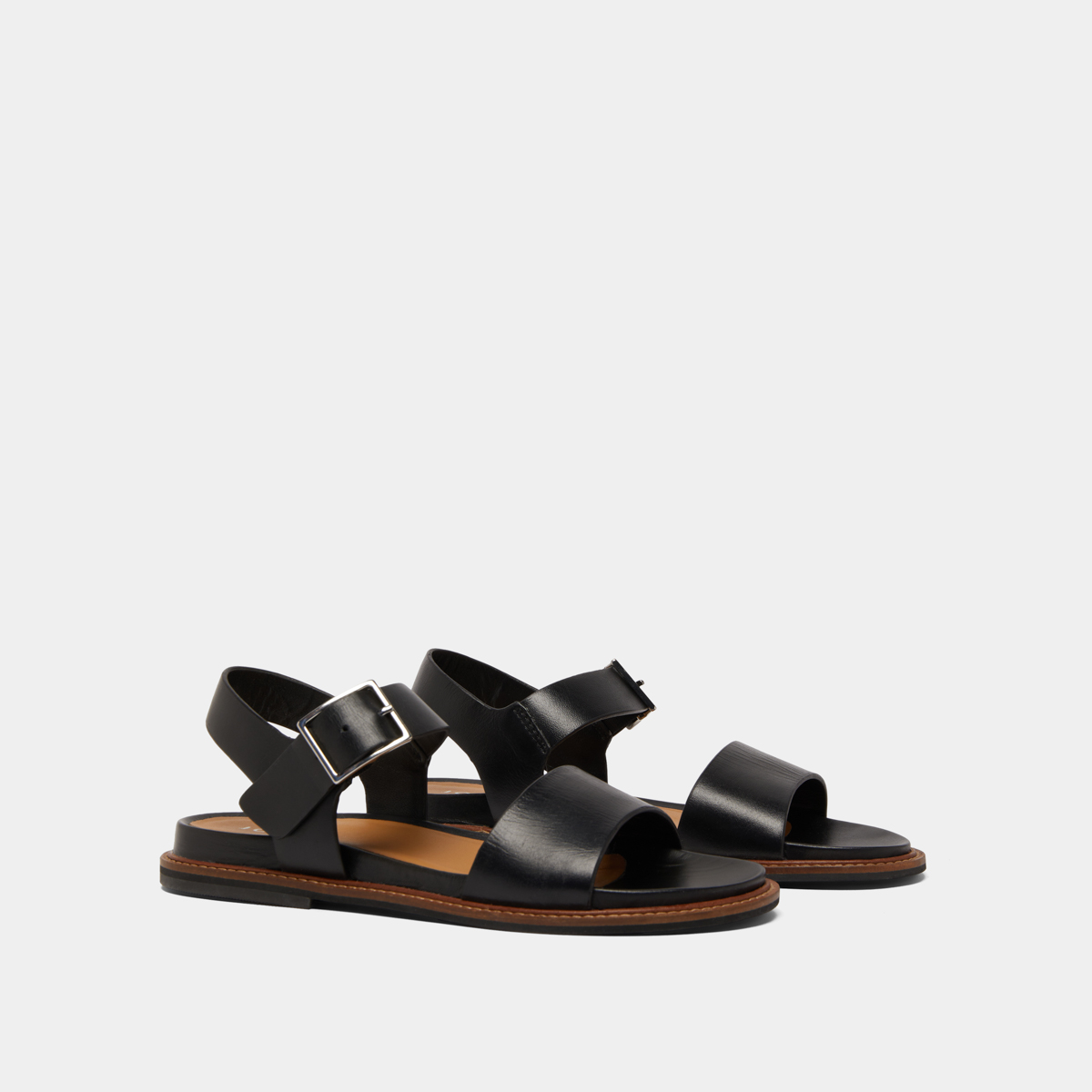 Sandals with straps and open toes in black leather | ACCO