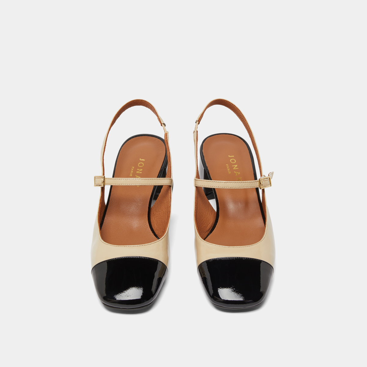 Heeled Mary Janes in black and ecru patent | DOUMY