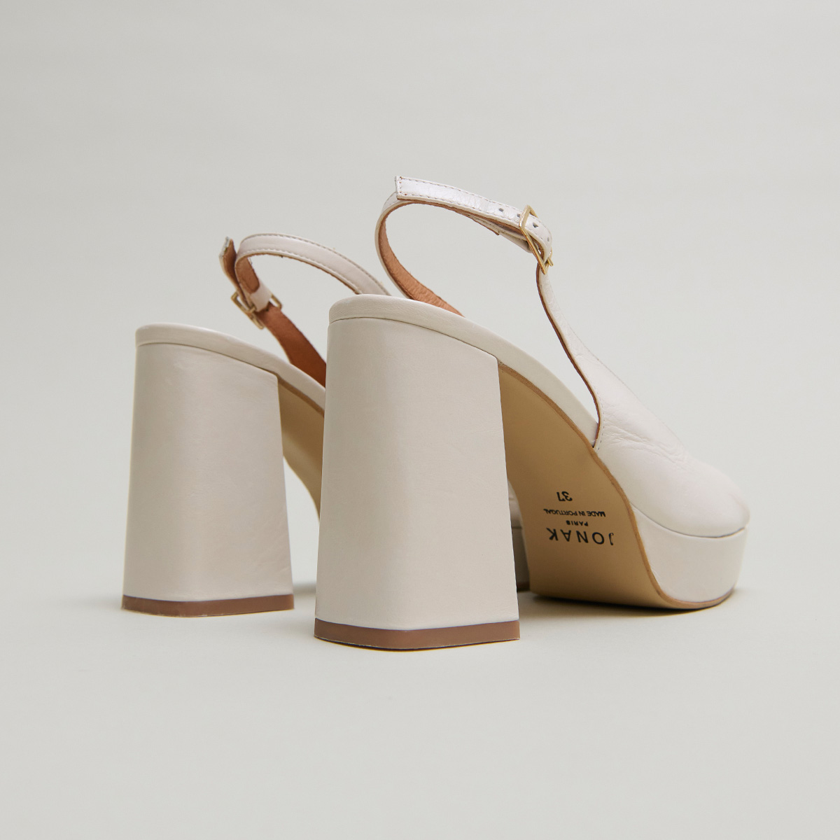 Square toe pumps with high heels in ecru aged leather | VLAD
