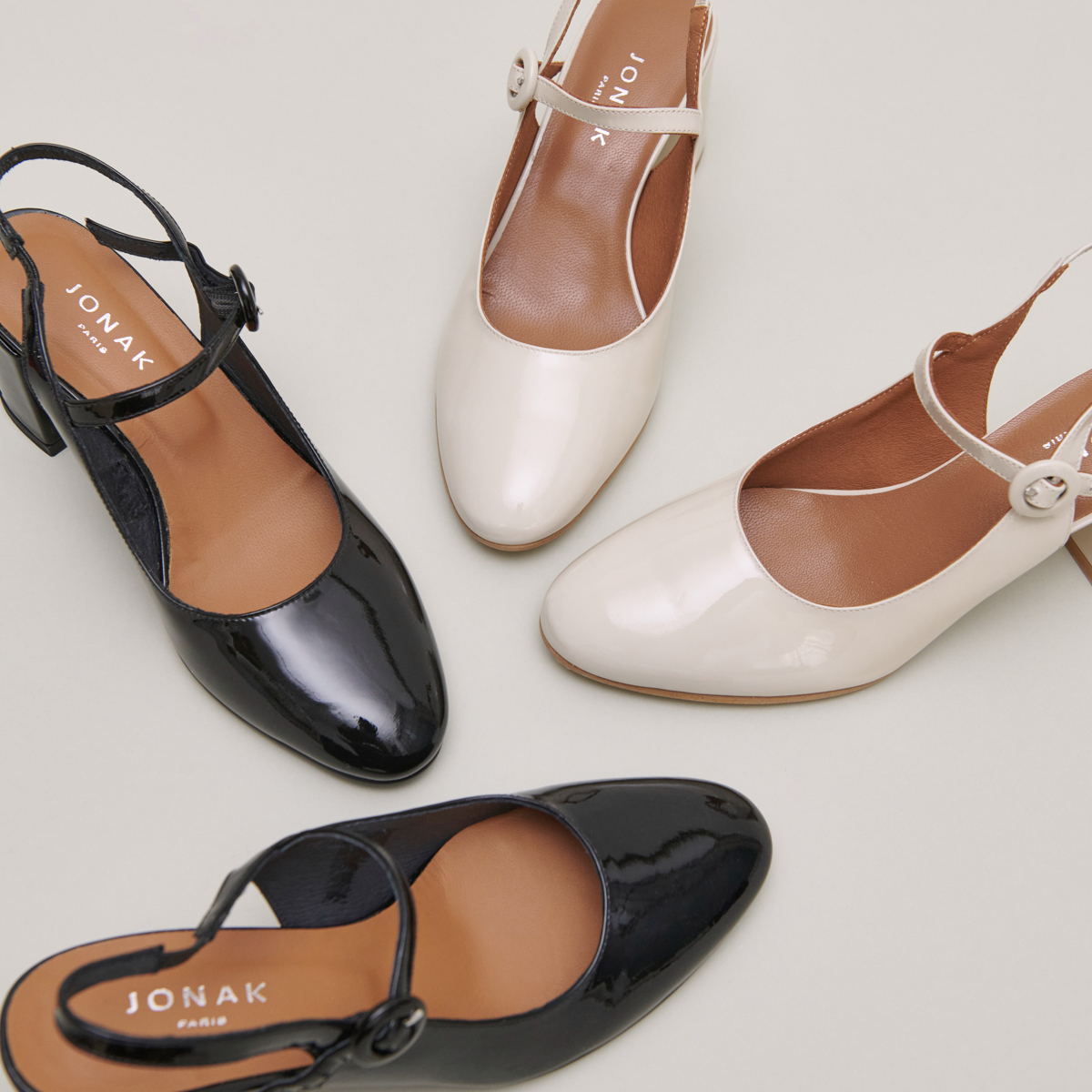 Pointed toe pumps with heels in ecru patent | DOLLAR
