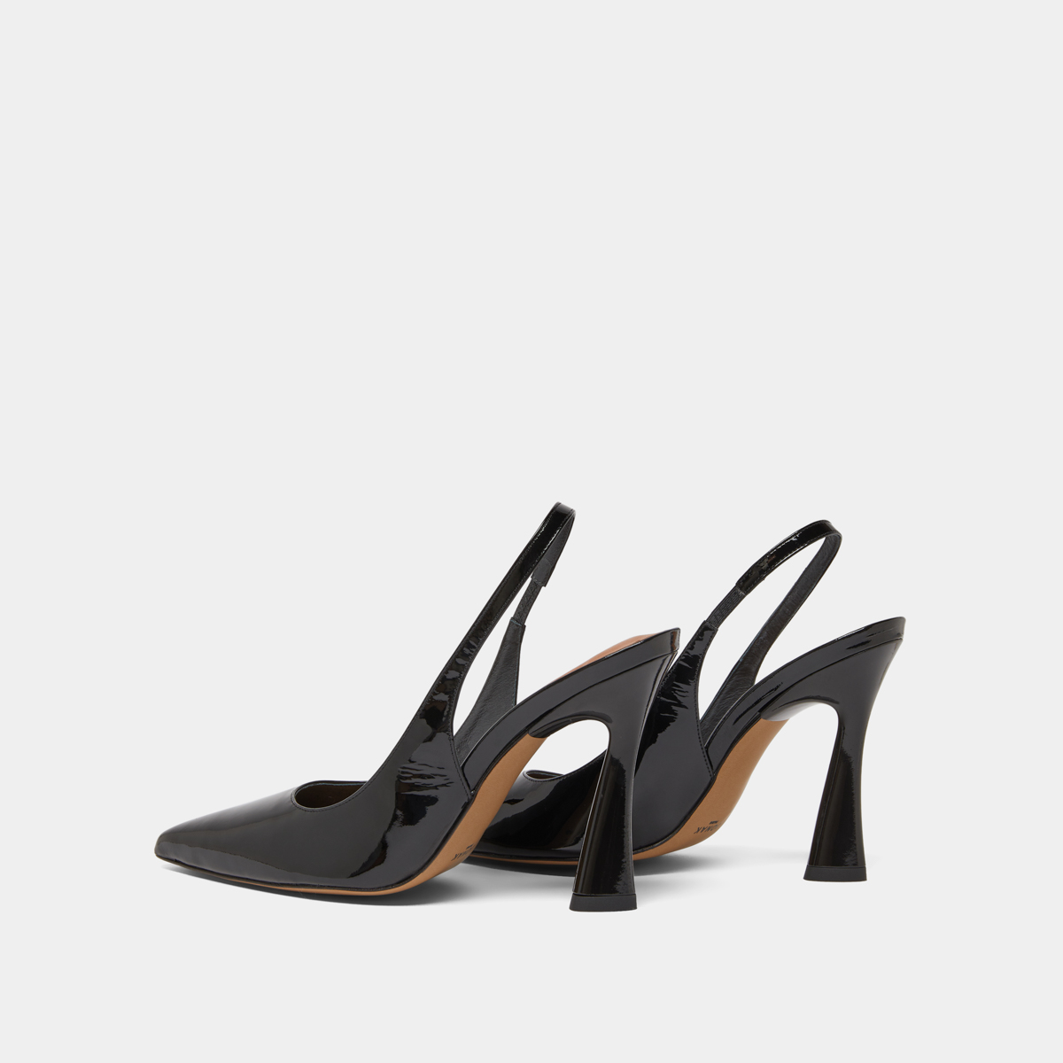 Pointed toe slingback pumps in black patent | DRESSY