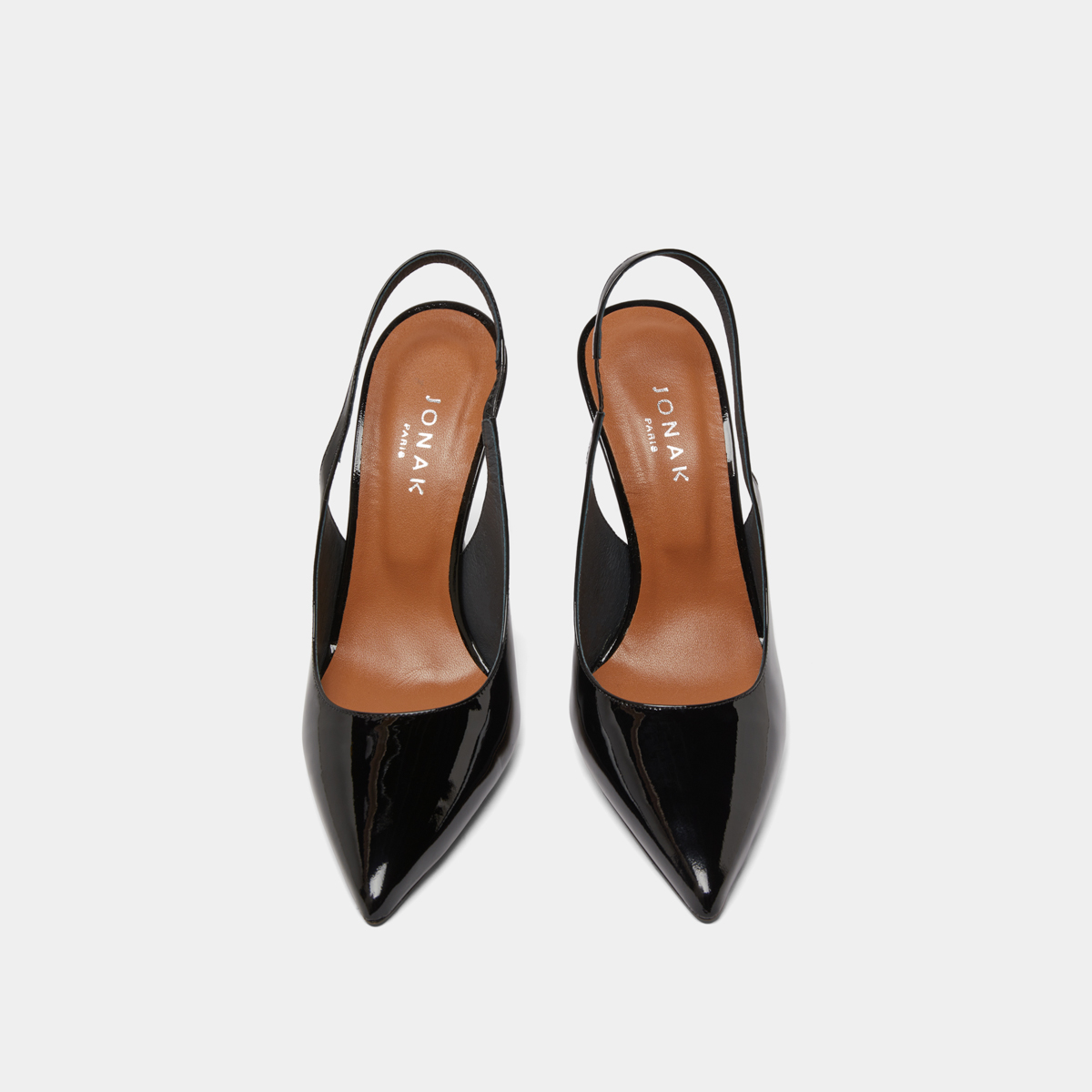 Pointed toe slingback pumps in black patent | DRESSY