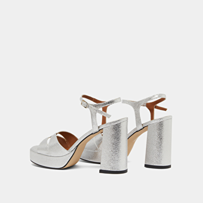 Platform sandals and high heels in silver metallic textile | JUSTINE