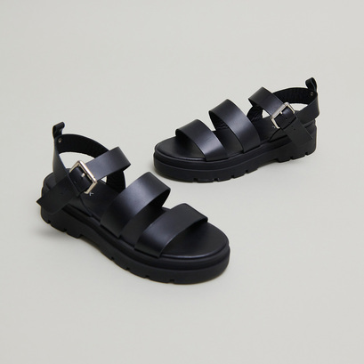 Platform sandals with buckles in black leather | priame