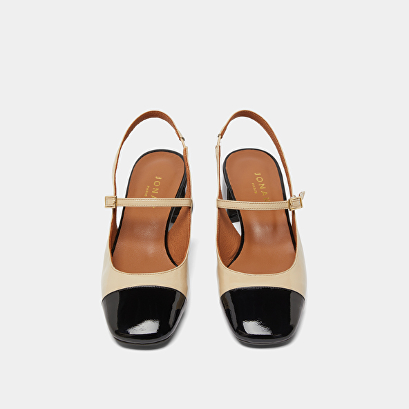 Heeled Mary Janes in black and ecru patent | DOUMY
