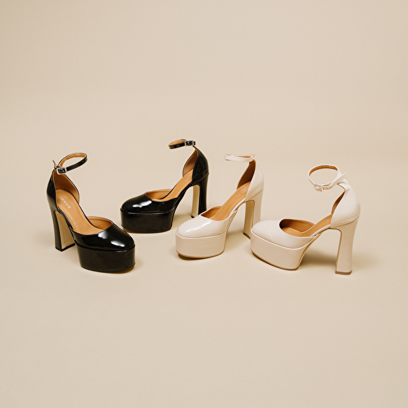 High heel pumps in beige patent | JENNY