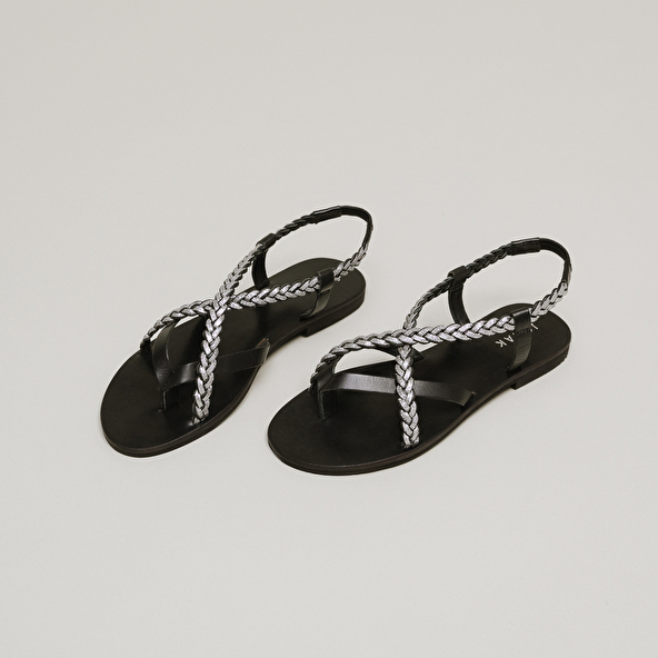 Sandals with braided straps in black and silver leather | WARREN
