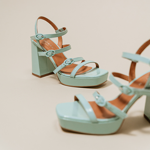 Sandals with straps and square toes in turquoise pleated leather | VALENS