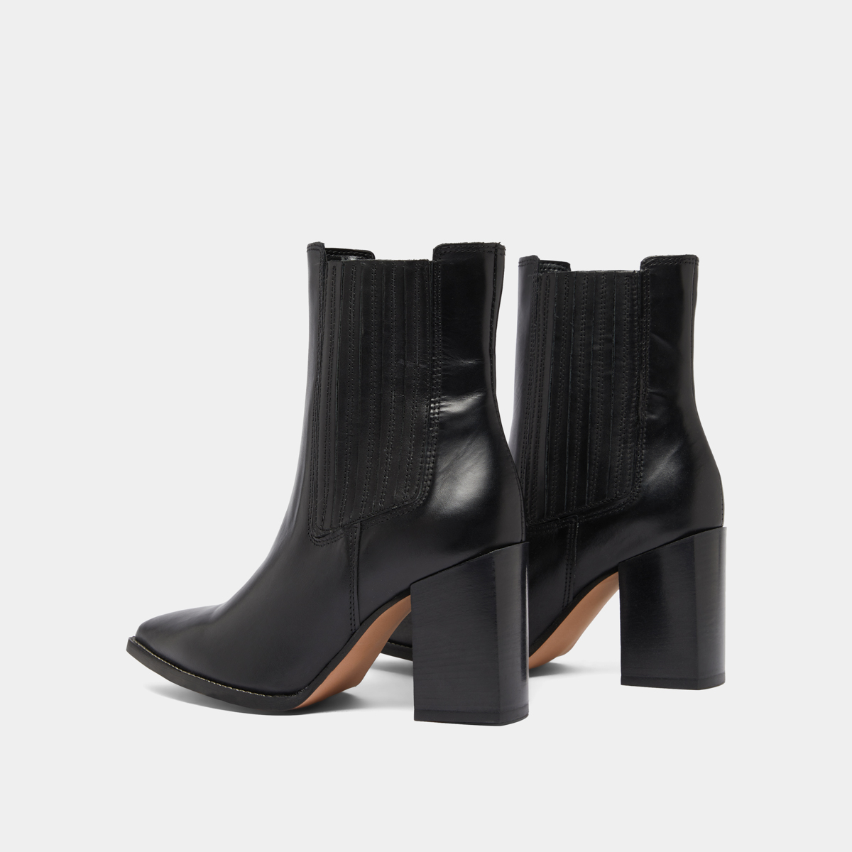 Ankle boots with heels and pointed toes in black leather | PERLINE