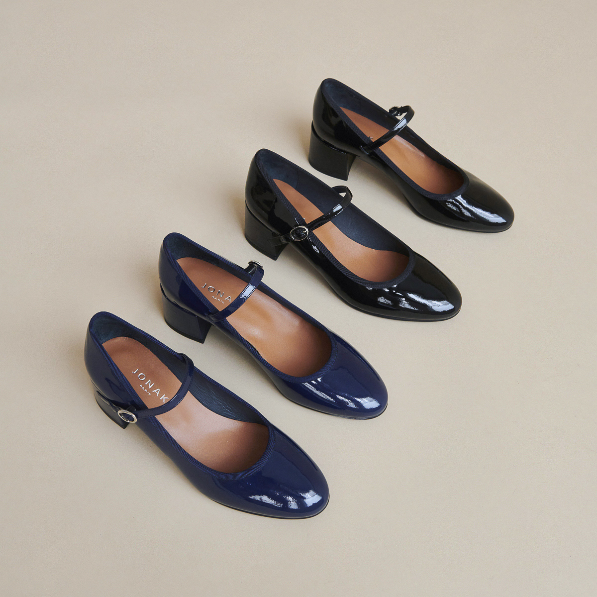 Heeled slippers in blue patent leather | DALMATIE