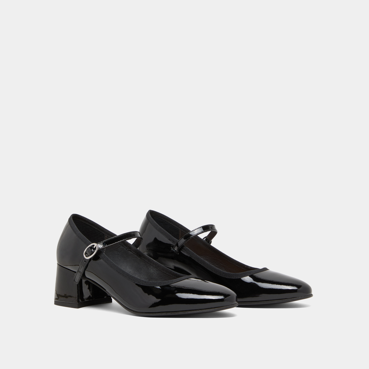 Heeled slippers in black patent leather | DALMATIE
