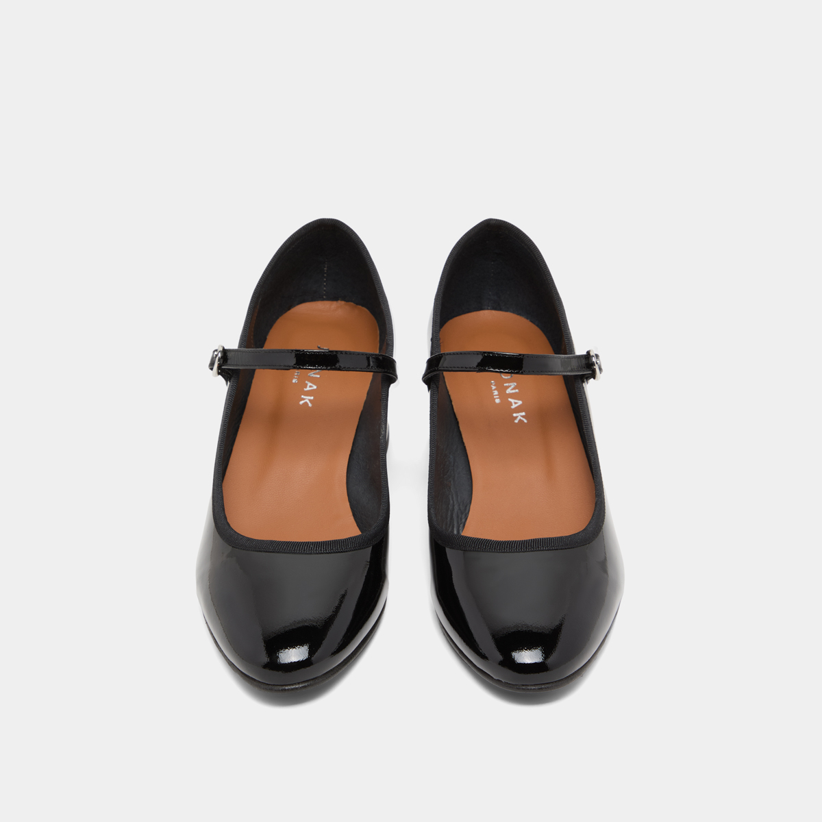 Heeled slippers in black patent leather | DALMATIE