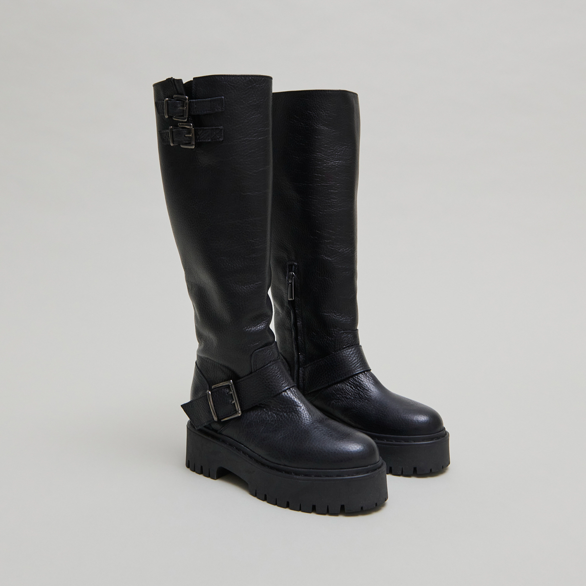 Chunky Strap Boots with Treaded Soles in black grained leather | REINE