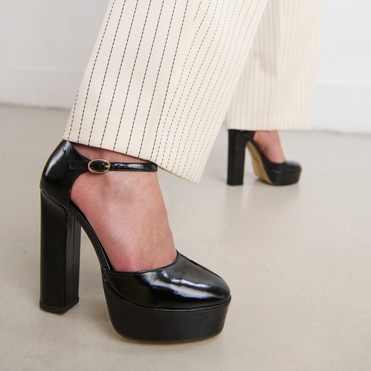 Heeled Mary Jane and platforms in black glazed leather | VANCOUVER