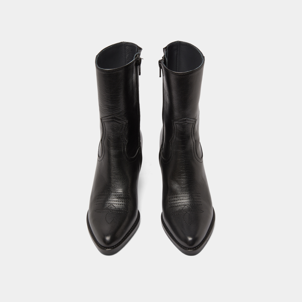 Heeled ankle boots with topstitch in black leather | DJAMENA