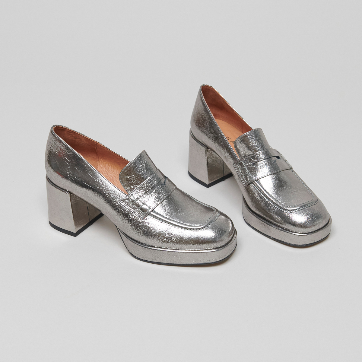 Loafers with platforms in silver leather | VOLTURA