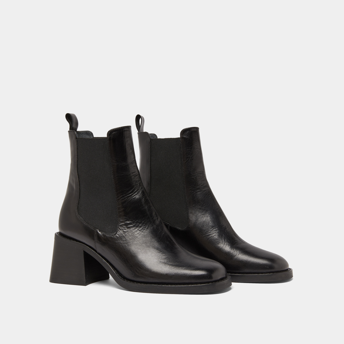 Ankle boots with elastics and chunky heels in black leather | DUCK