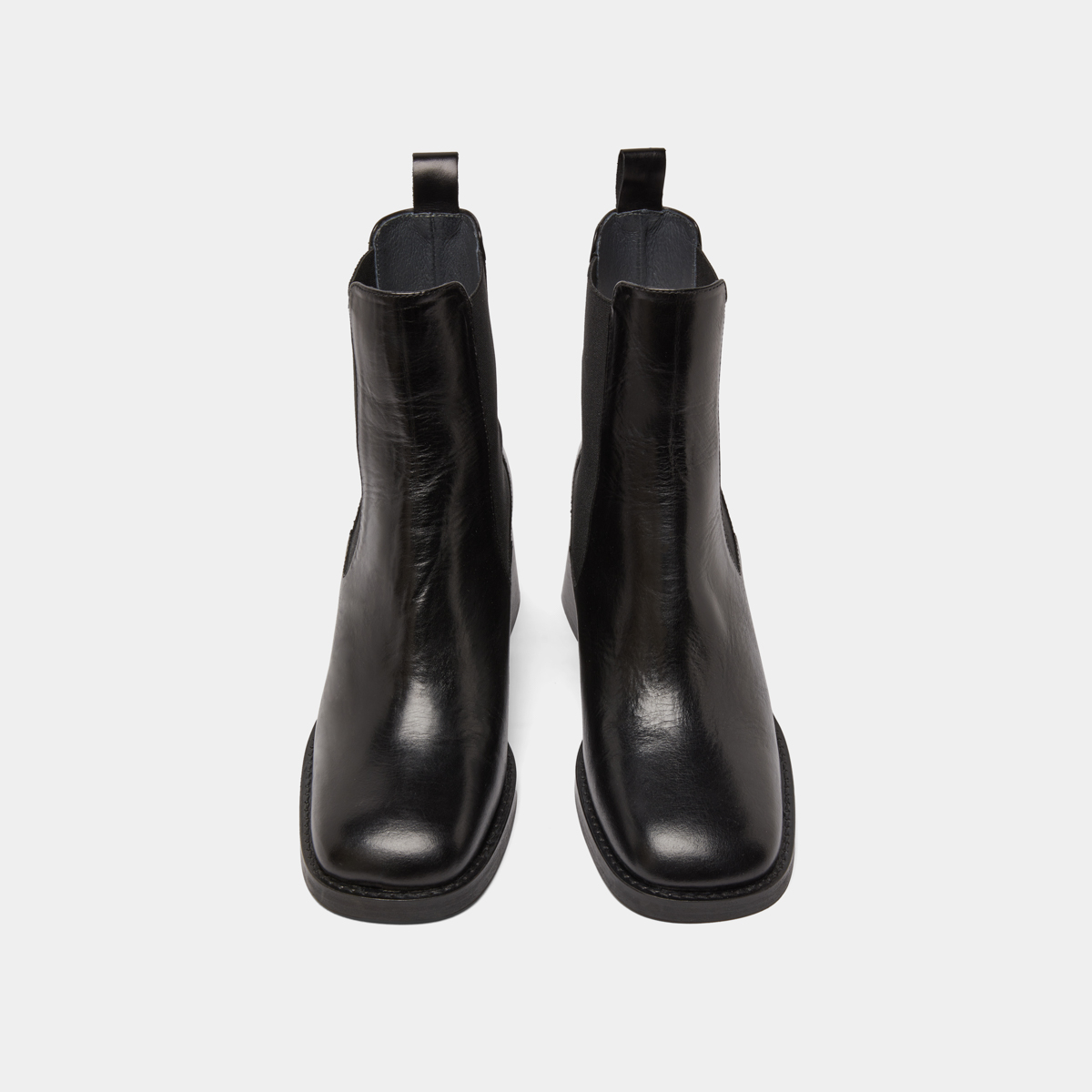 Ankle boots with elastics and chunky heels in black leather | DUCK
