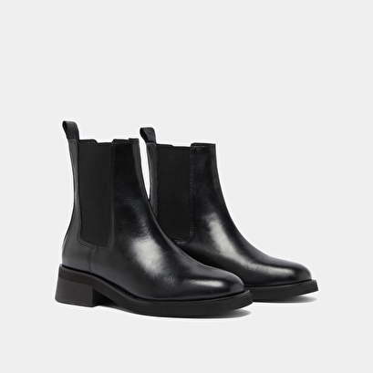 Boots &agrave; bouts arrondis et &eacute;lastiques in black leather | parisse