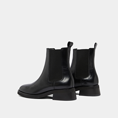 Boots &agrave; bouts arrondis et &eacute;lastiques in black leather | parisse