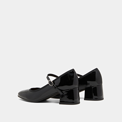 Heeled slippers in black patent leather | dalmatie