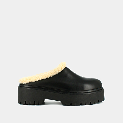 Round-toed mules with notched soles black