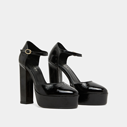 Heeled mary jane and platforms in black glazed leather | vancouver