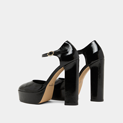 Heeled mary jane and platforms in black glazed leather | vancouver