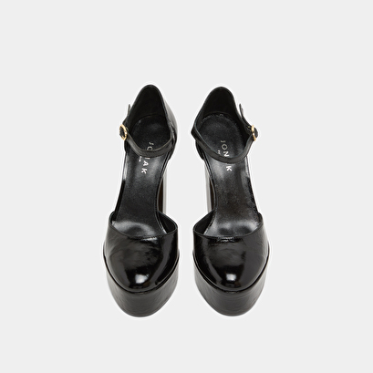 Heeled mary jane and platforms in black glazed leather | vancouver