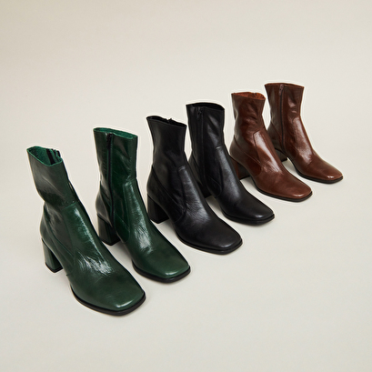 Oval-toe boots in brown aged leather | argentat