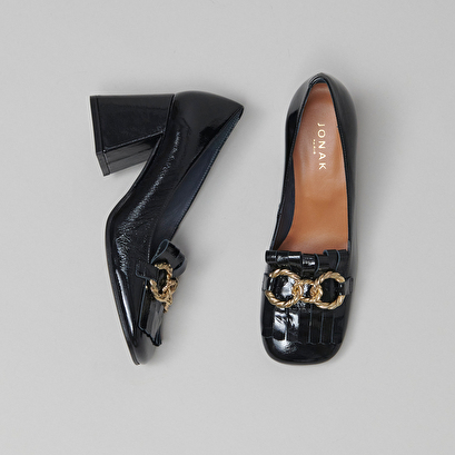 Heeled loafers with gold buckles black