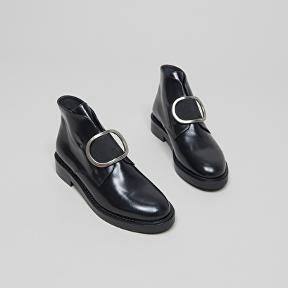 Boots with heels in black leather | dictee