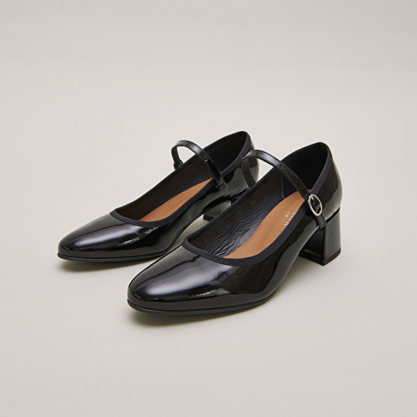 Heeled slippers in black patent leather | DALMATIE